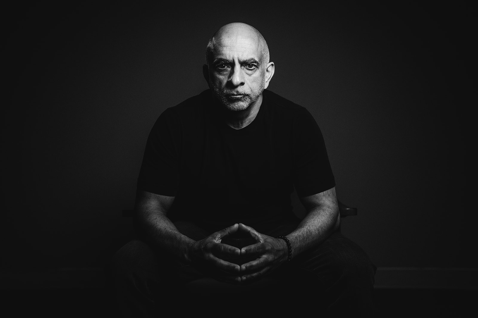 Tan Rao professional headshot in black and white studio lighting.
