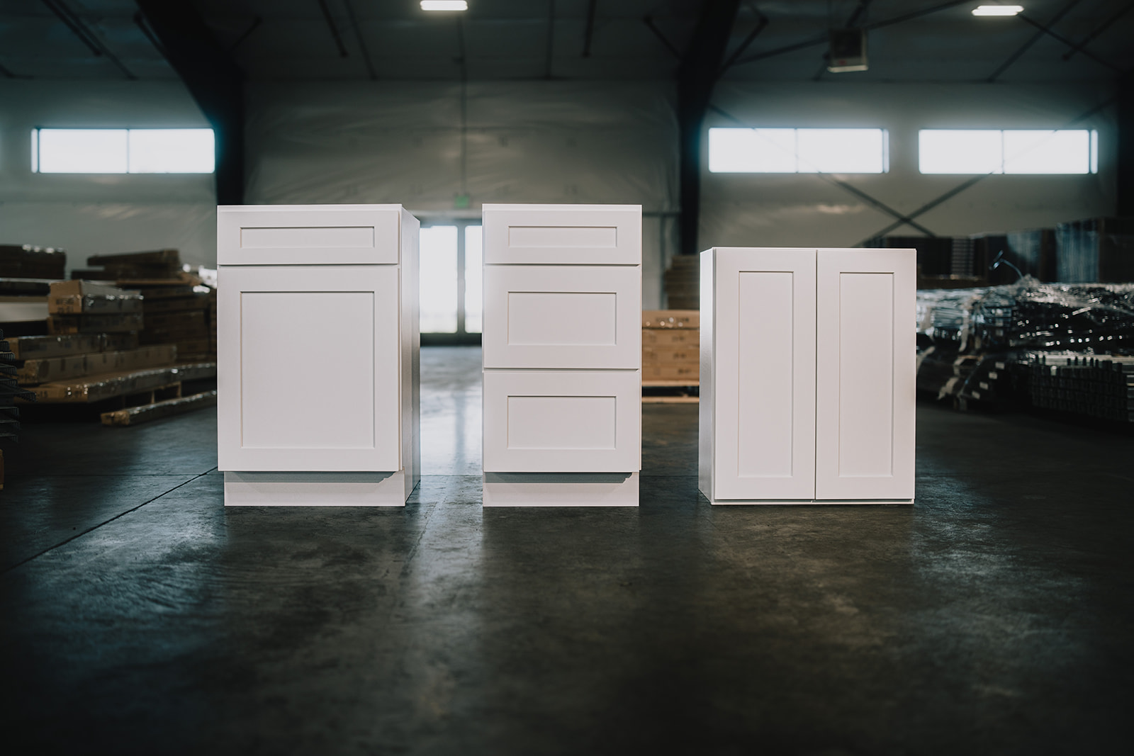 White cabinet products arranged in a warehouse